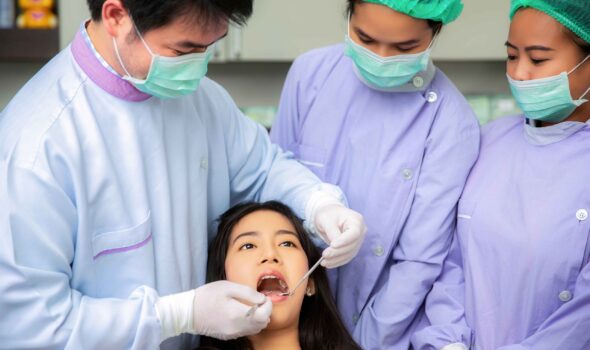 asian-woman-decayed-tooth-operation-dental-clinic-with-her-dentist-doctor-professional-dental