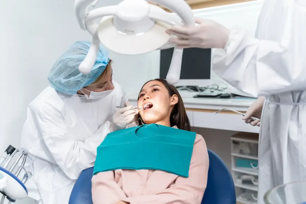 A woman undergoing a general dentistry procedure at a bukit timah dentist