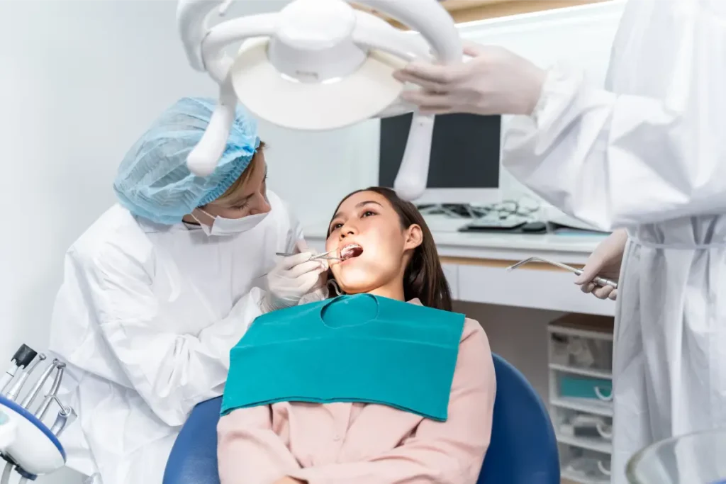A woman undergoing a dental consultation from a dentist for toothache
