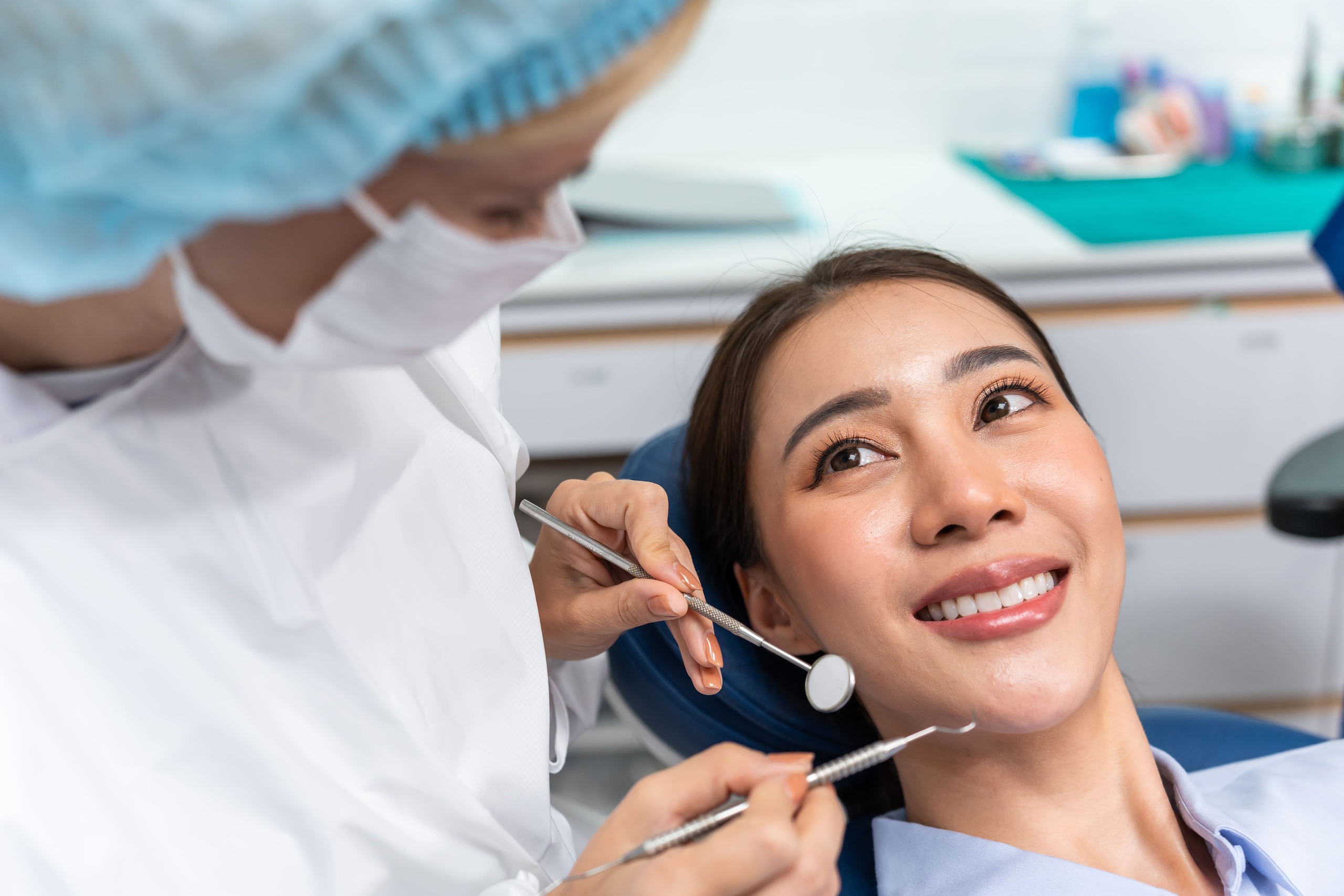 a woman having a dental check up before her dental prosthesis procedure in Singapore